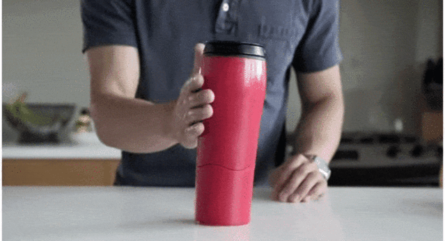 tumbler water cup display stand.gif